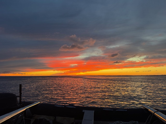 Sunset over the water in Grand Casse
